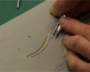 Linocut - cutting the key block